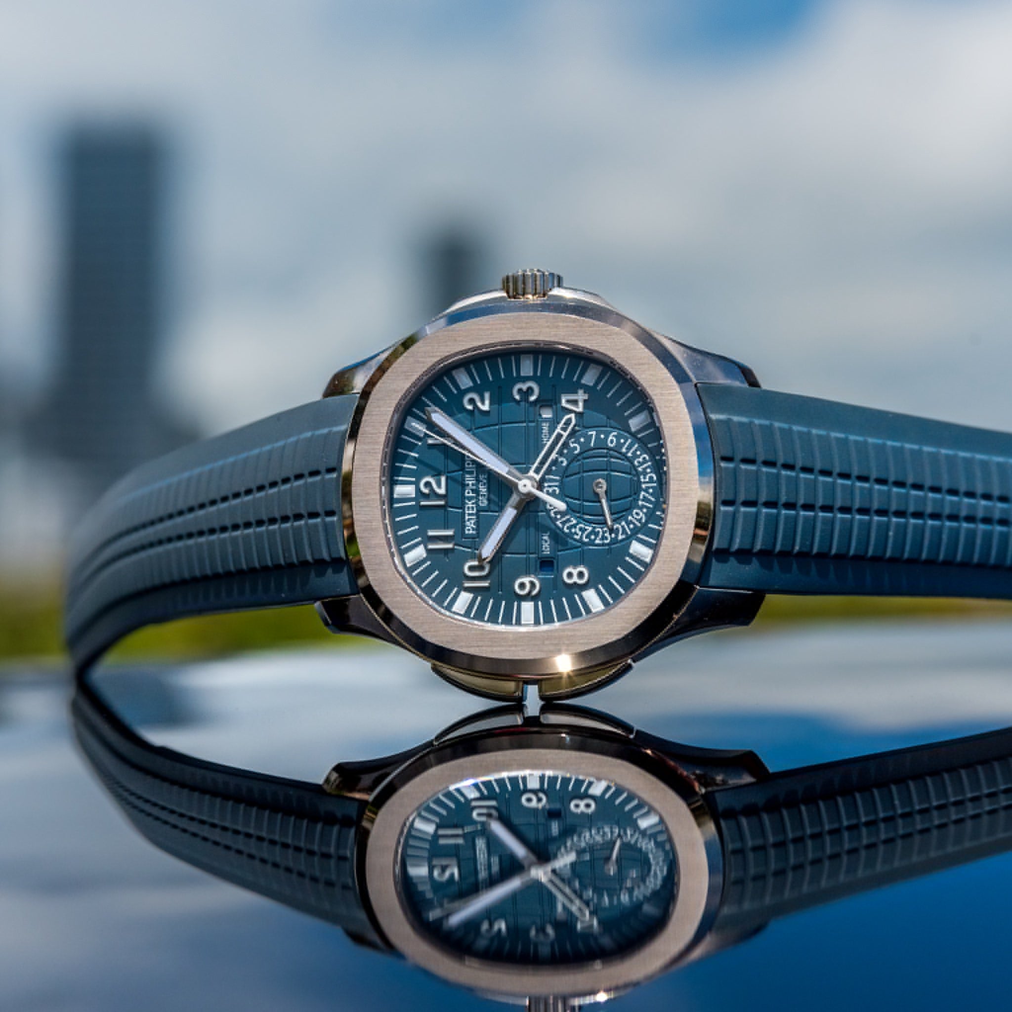 Patek Philippe Aquanaut Travel Time Blue: Ultimate Luxury Watch for Travelers